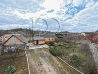 Продаж житлового будинку з ділянкою 25 соток, 2 заїздами в с.Ходосівка