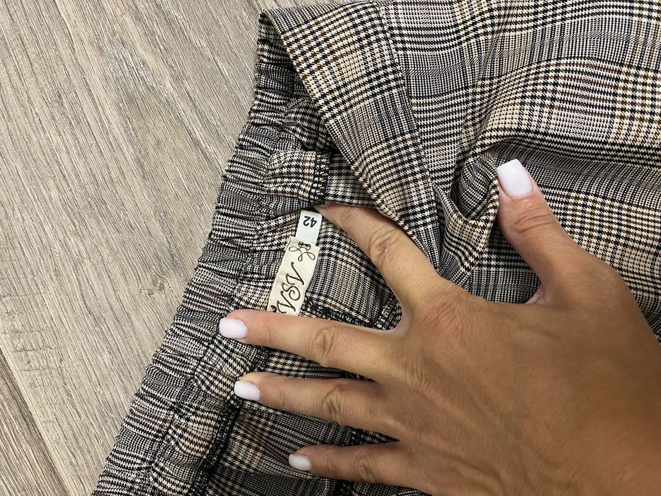 Костюм брючний в клітинку