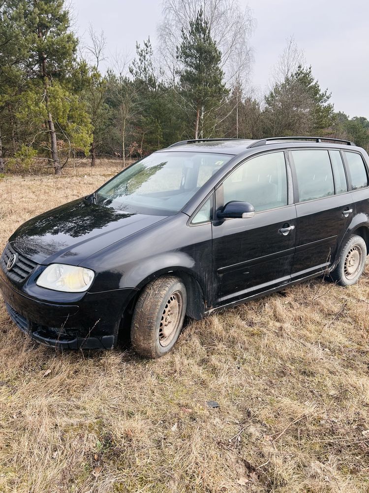 Części Volkswagen Touran/lampy/maska/drzwi/rozrusznik/turbo/zderzak