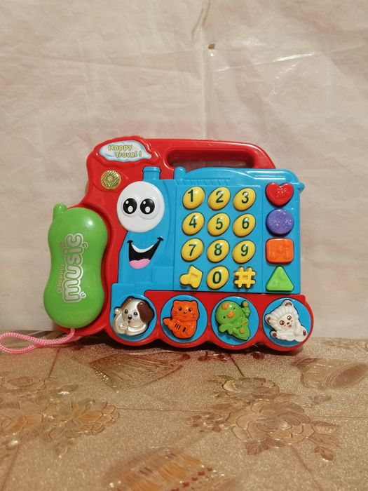 Duże pianino -keyboard-telefon wesoły pociąg ze zwierzętami.