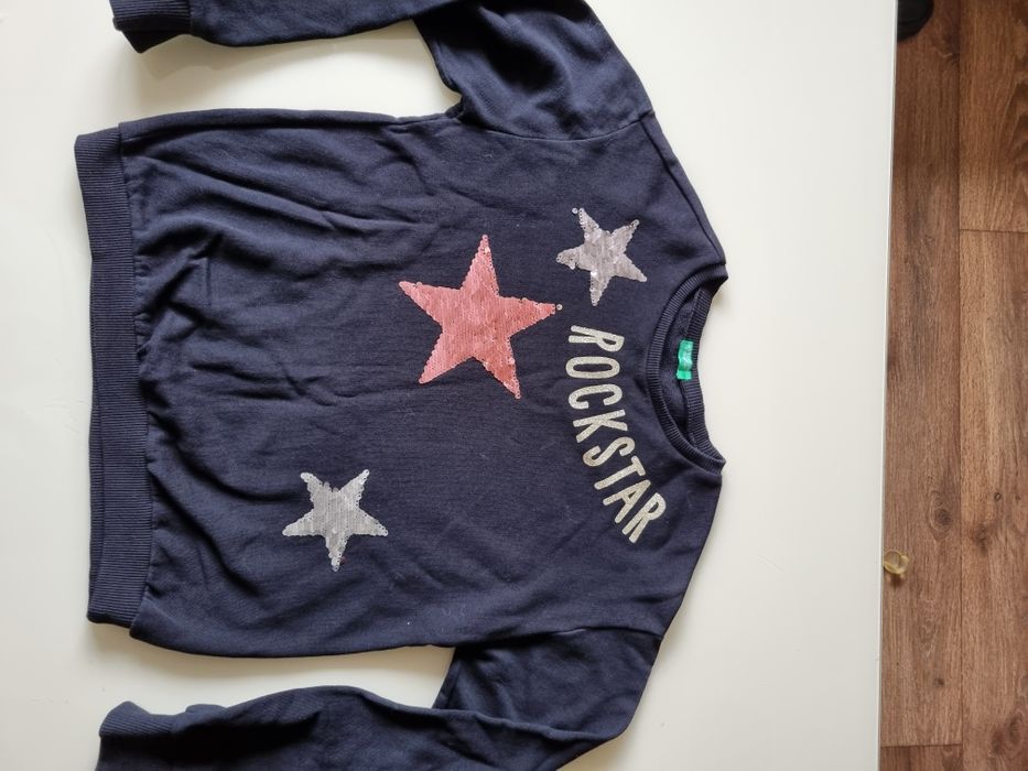 Джемпер черный с принтом Rockstar (Benetton), на девочку  11- 12 лет.