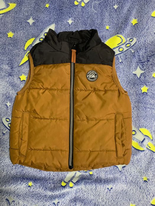 Верхній одяг для хлопчика. Куртки, жилетки