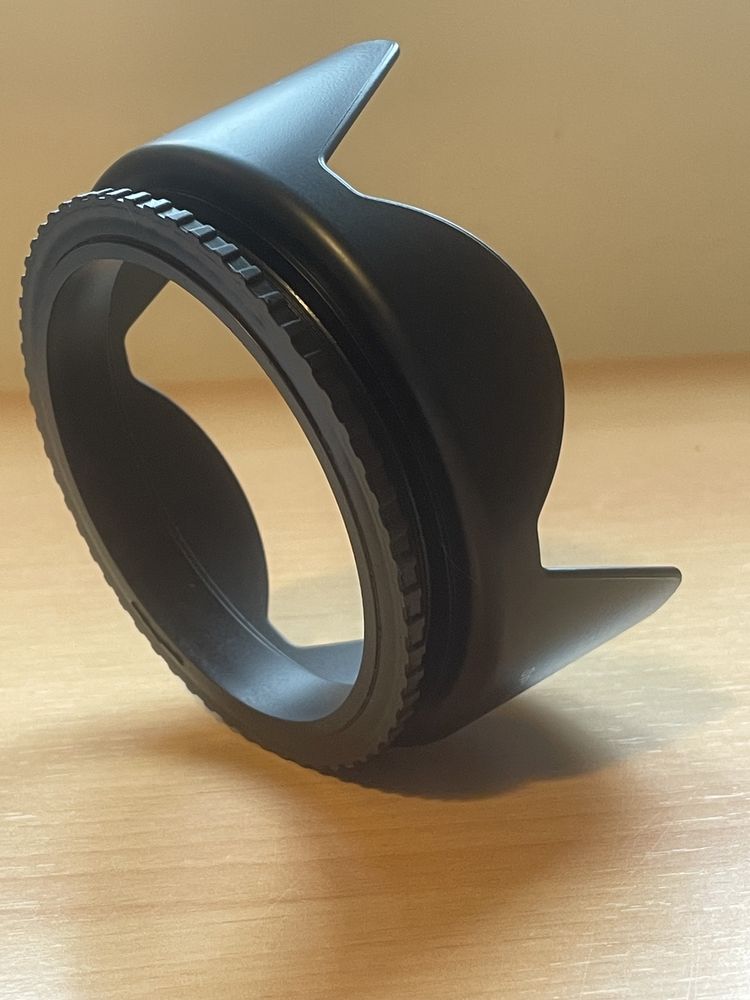 “Para sol” para objetiva com 82 mm