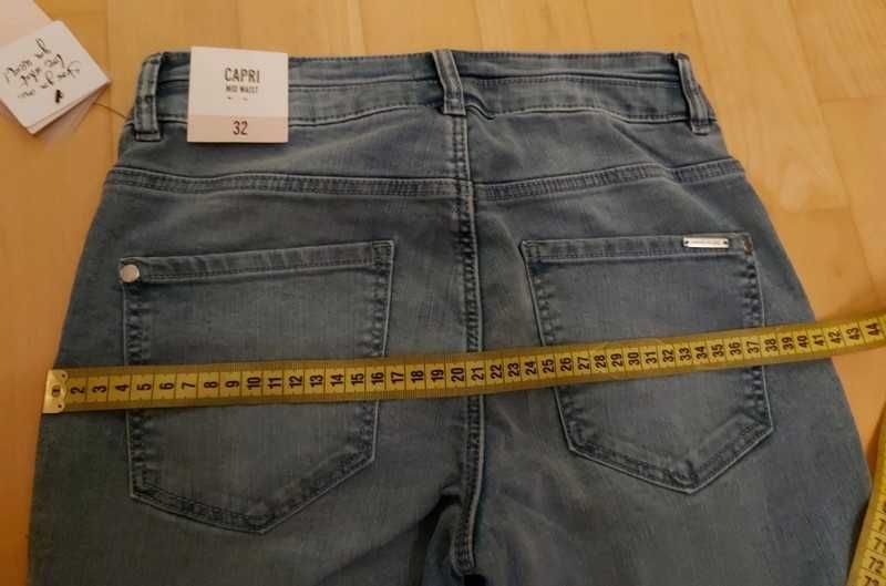 Nowe spodnie typu Capri marki Orsay - r. 32/XXS