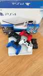 PlayStation 4 Slim 500GB with disc drive+4 controllers+wireless charge