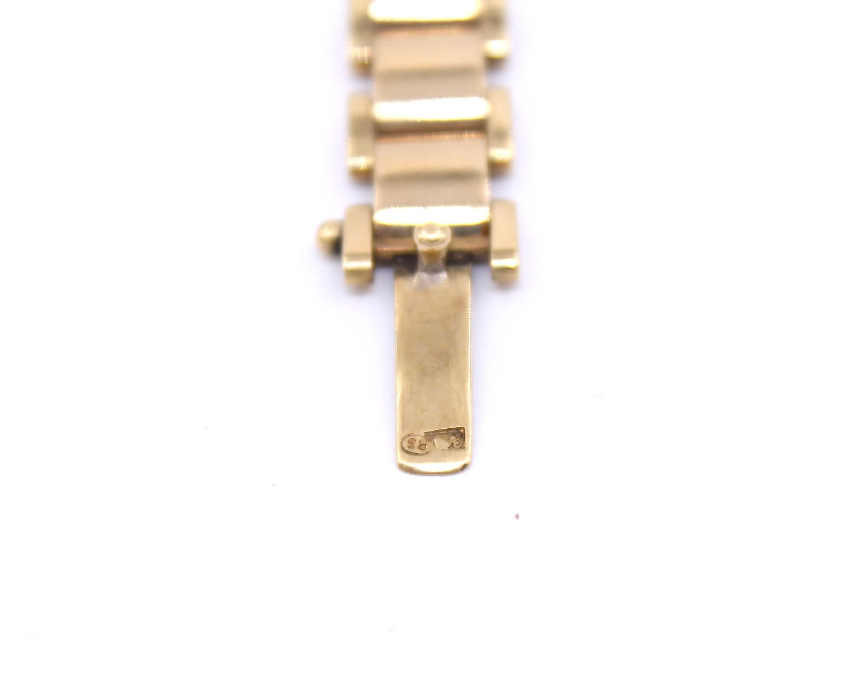 Złoty zegarek p.585/30,90g - Szwajcarskiej firmy Doxa