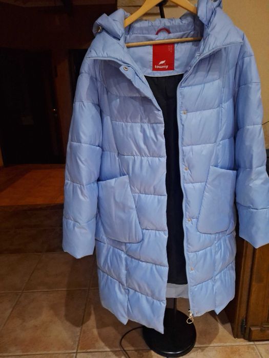 Продам жіночий суперпуховик ( наповнення пух-перо) блакитного коліру.
