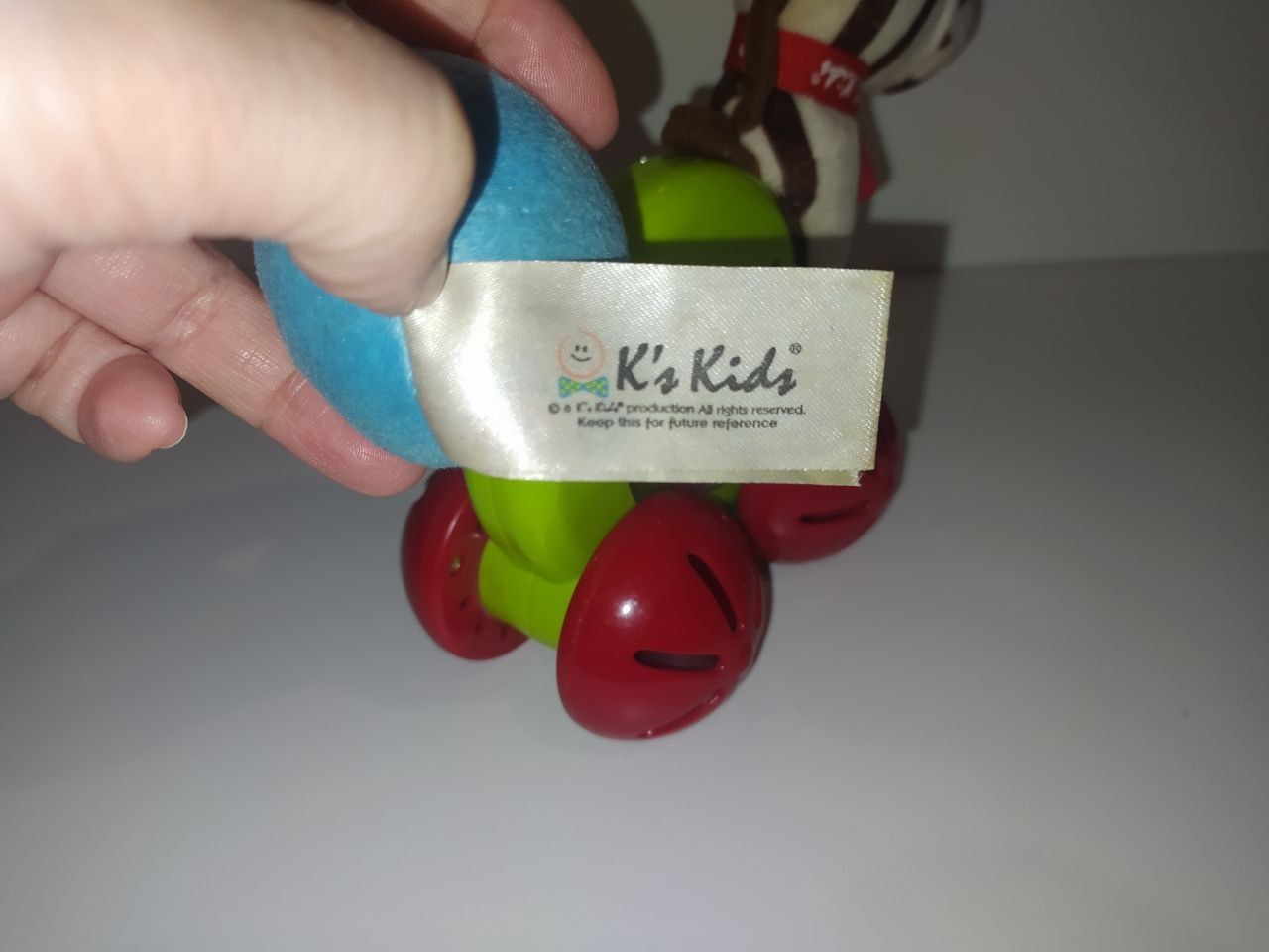 Каталка-погремушка зебра на колёсиках K's Kids