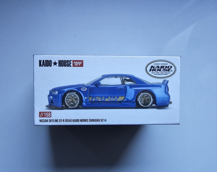 Mini GT Kaido House Nissan Skyline GT-R R34 autko model 1:64 shinjuku