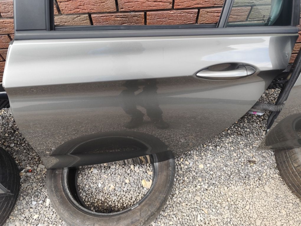 Drzwi lewy przód tył przednie tylne opel astra k kombi z10a