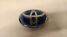 TOYOTA YARIS CROSS ZNACZEK LOGO EMBLEMAT PRZÓD ATRAPY 75310-0D010 20-25