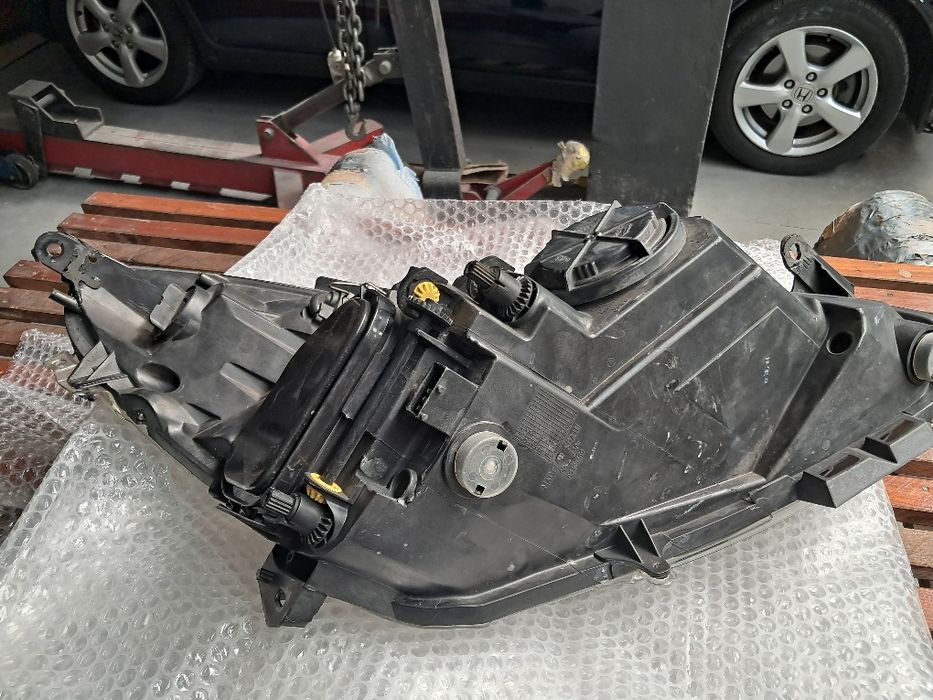 Farol esquerdo Opel Corsa D
