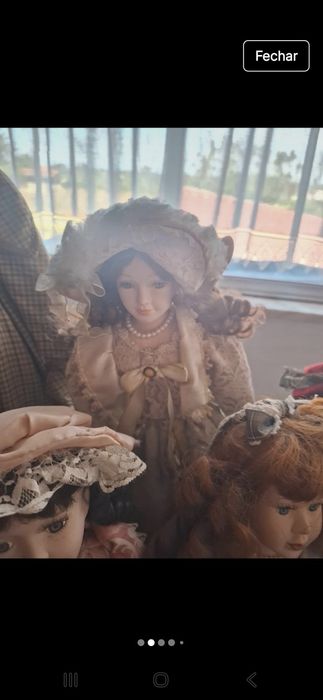 Bonecas em porcelana