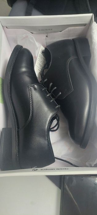 Sapatos com atacadores