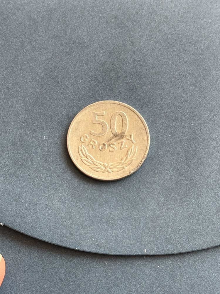 Dwie stare monety 50 groszy z 1983 roku oraz 1 grosz z 2000 roku PRL