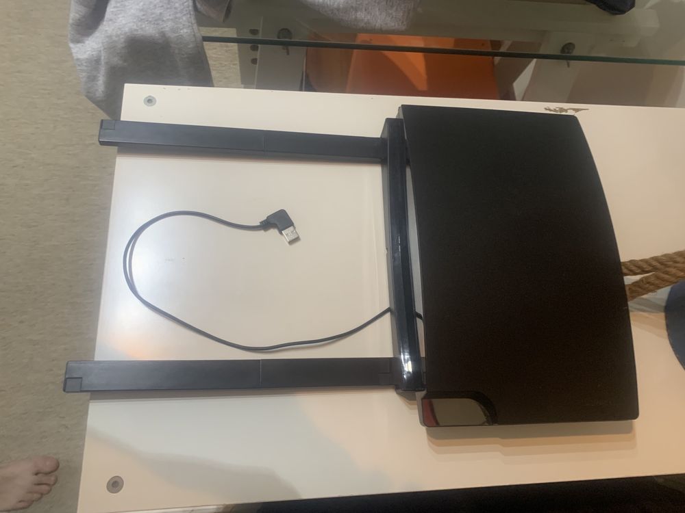 Acessório para guardar e carregar comandos PS3