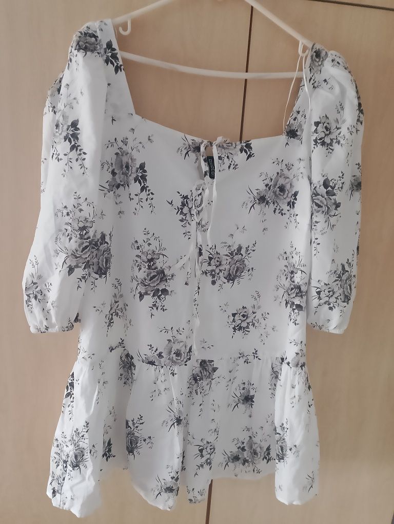 Bardzo ładna damską bluzka,z baskinką nowa H&M