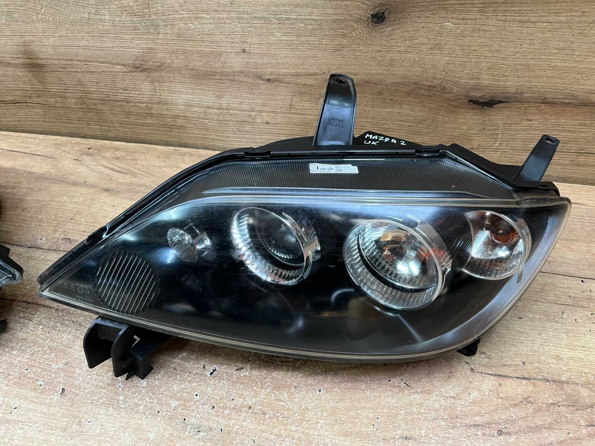 Lampa/reflektor przedni lewy prawy Mazda 2 Soczewka