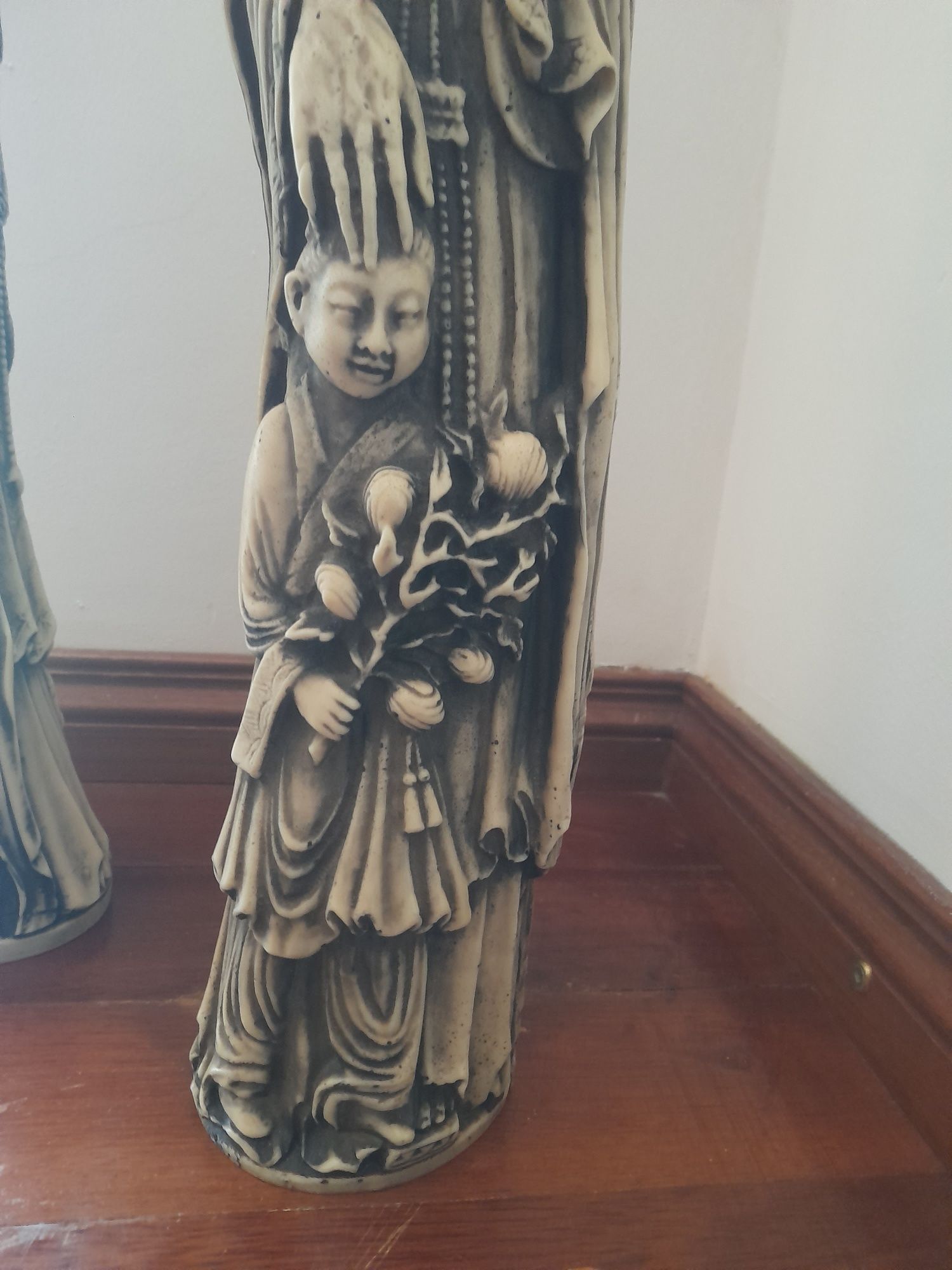 Estatuetas orientais (marfinite)