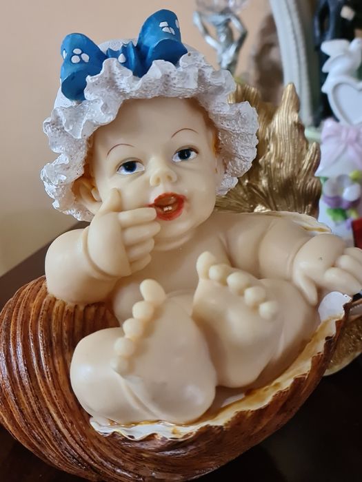 Skarbonka dziecko w muszli