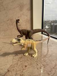 Два динозаври іграшки діно