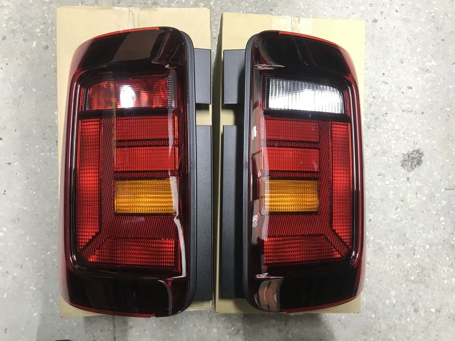 Фонарі задні стопи темні оригінал нові Caddy Кадді 04-20р