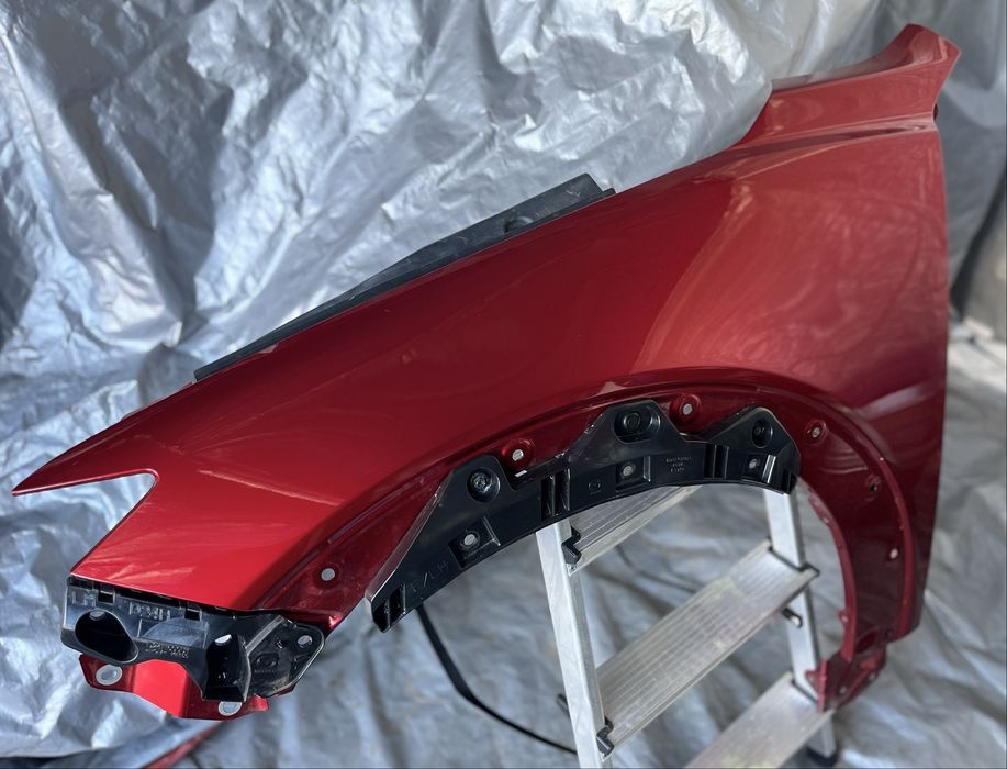 Blotnik lewy mazda cx3 2015< oryginal igla w kolor 41V kompletny