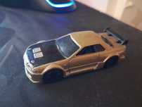 Raro- Carro Hotwheels Nissan Skyline 2001 Dourado e preto fosco