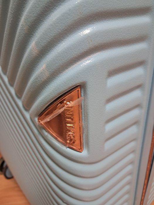 Walizka  na 4 kółkach, niebieska. 60/40/25.