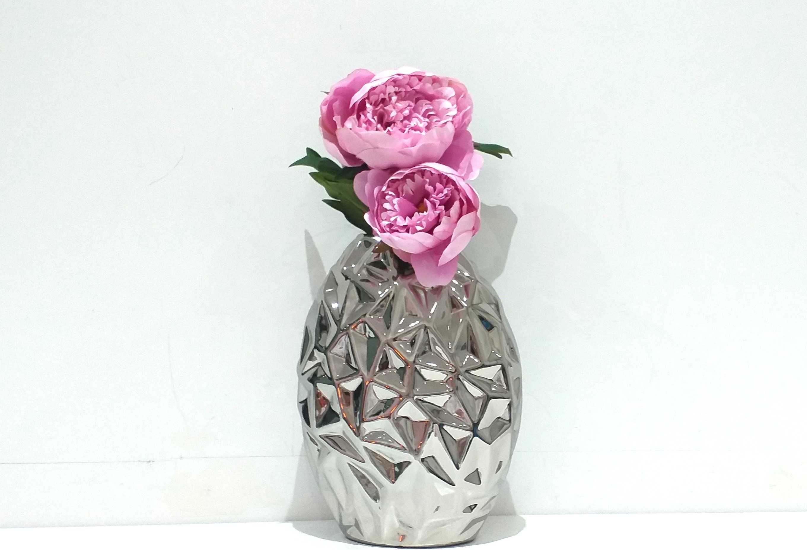 Peças decorativas em prateado  de grandes dimensões