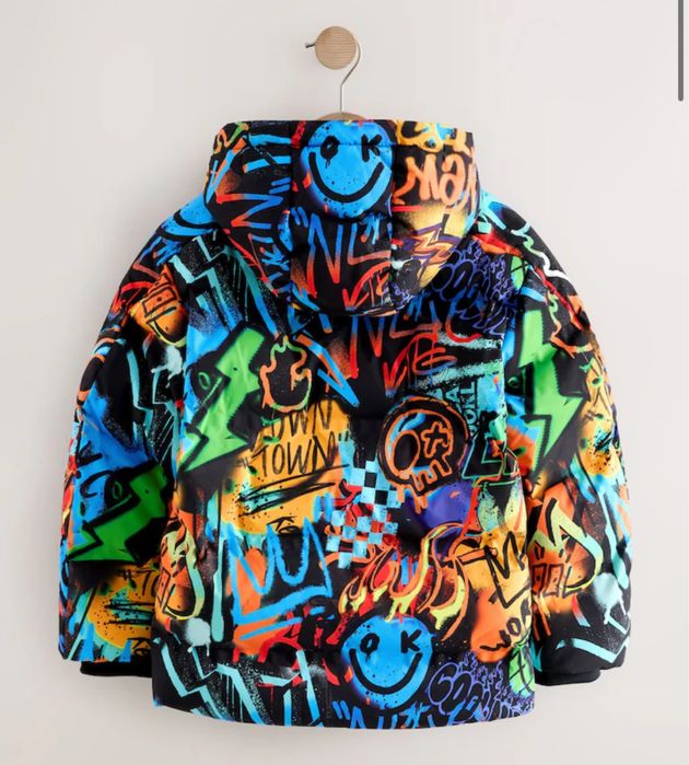 Яскрава зимова куртка Next в наявності