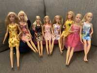 Bonecas Barbie como novas