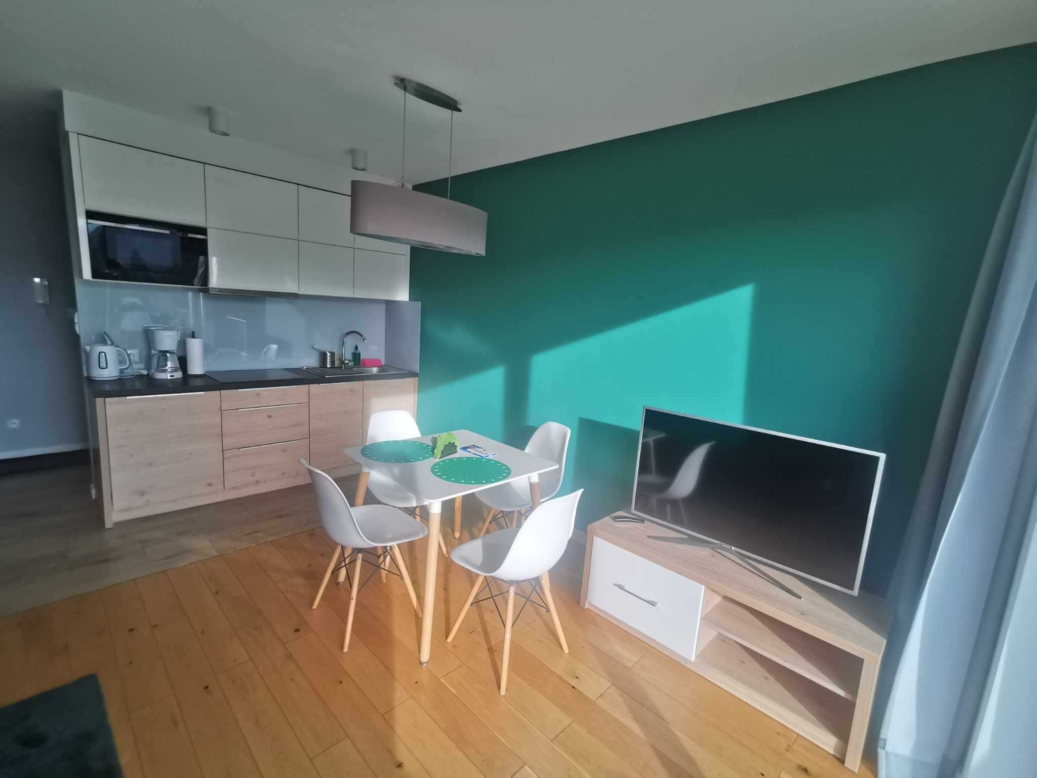 Apartament z tarasem i pięknym widokiem.