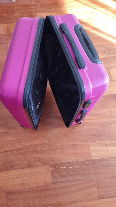 Różowa walizka podróżna Witchen o wymiarach 65x45x27 cm