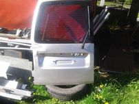 VW Caddy 3 III Drzwi Lewe Tylne Lewy Tył Skrzydełko Szyba Zamek