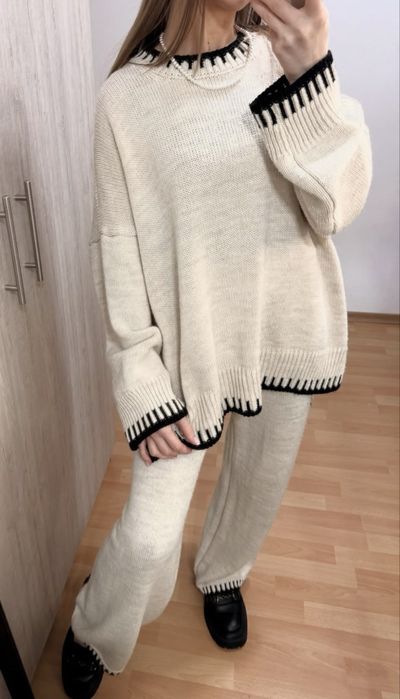 Жіночий вʼязаний костюм