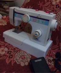 Máquina de costura elétrica