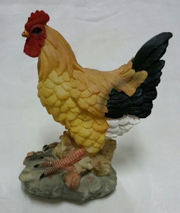 Estatuetas de animais em resina pintada