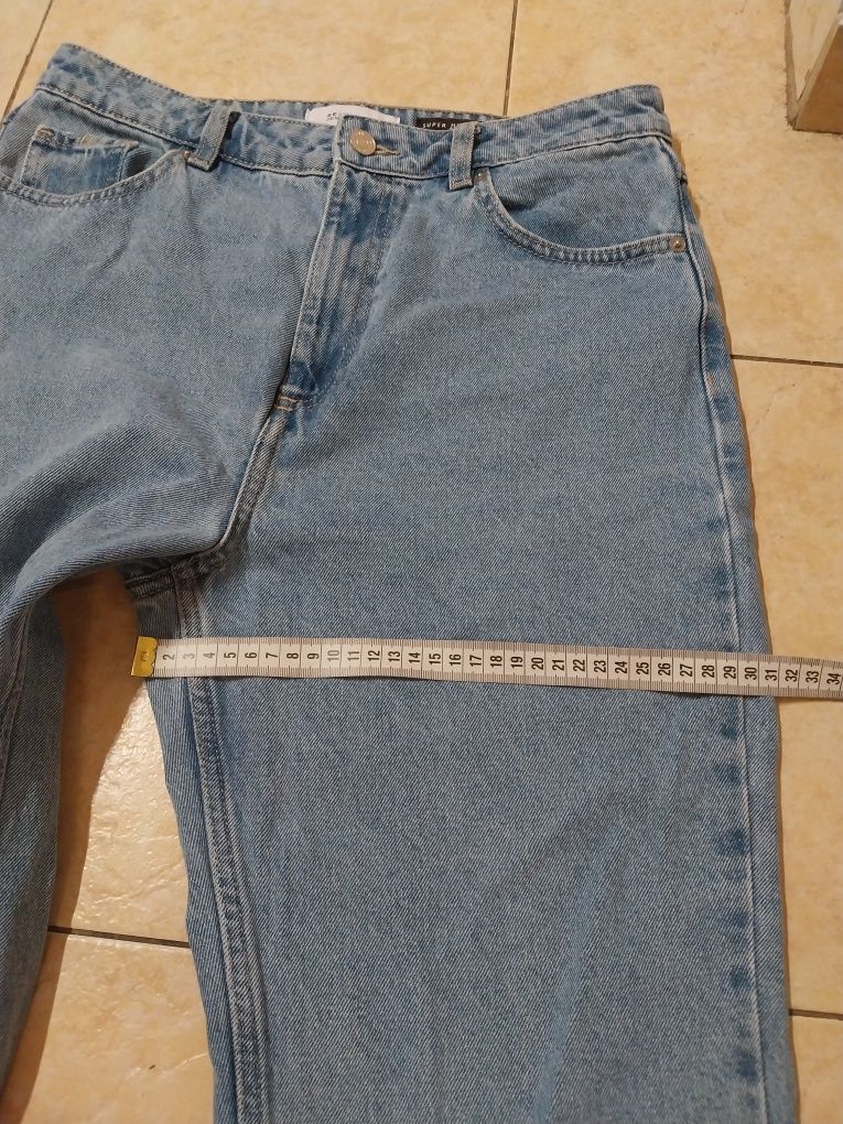 Spodnie jeans reserved