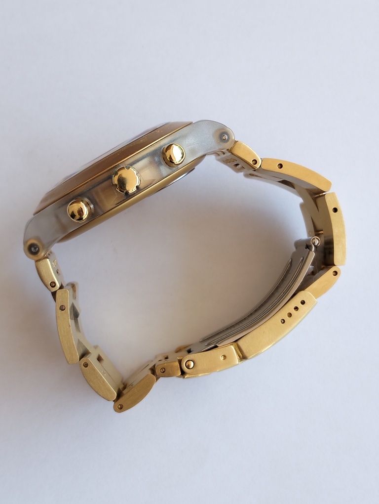 Vendo relógio dourado Swatch