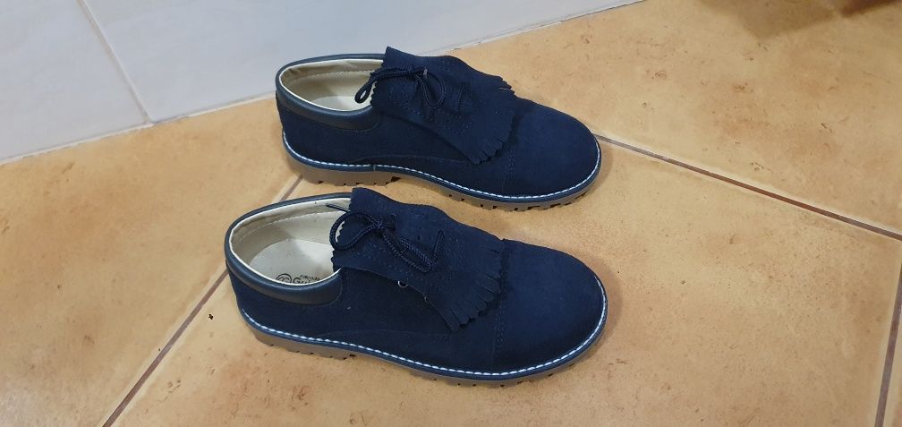 Par sapatos azul criança