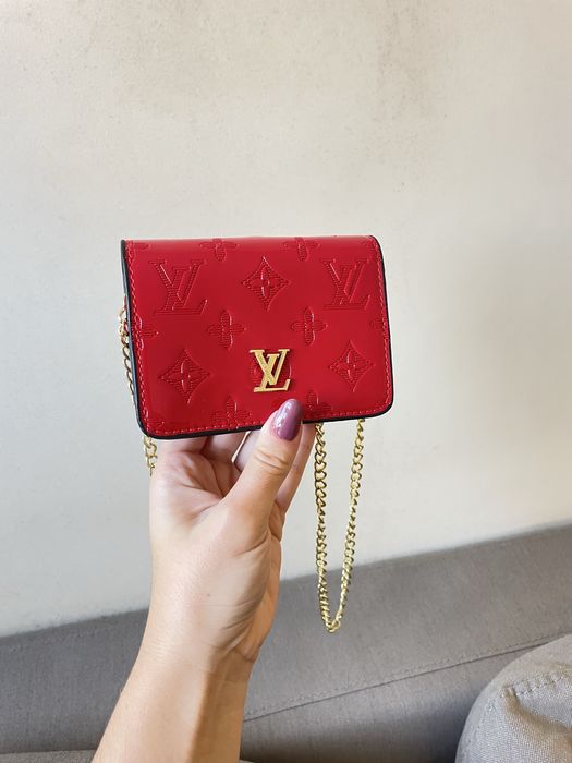 Mala tira colo de mulher