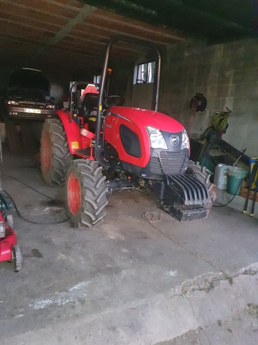 Trator kiot35dk com reboque