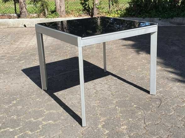 Mesa extensível com tampo em vidro temperado preto