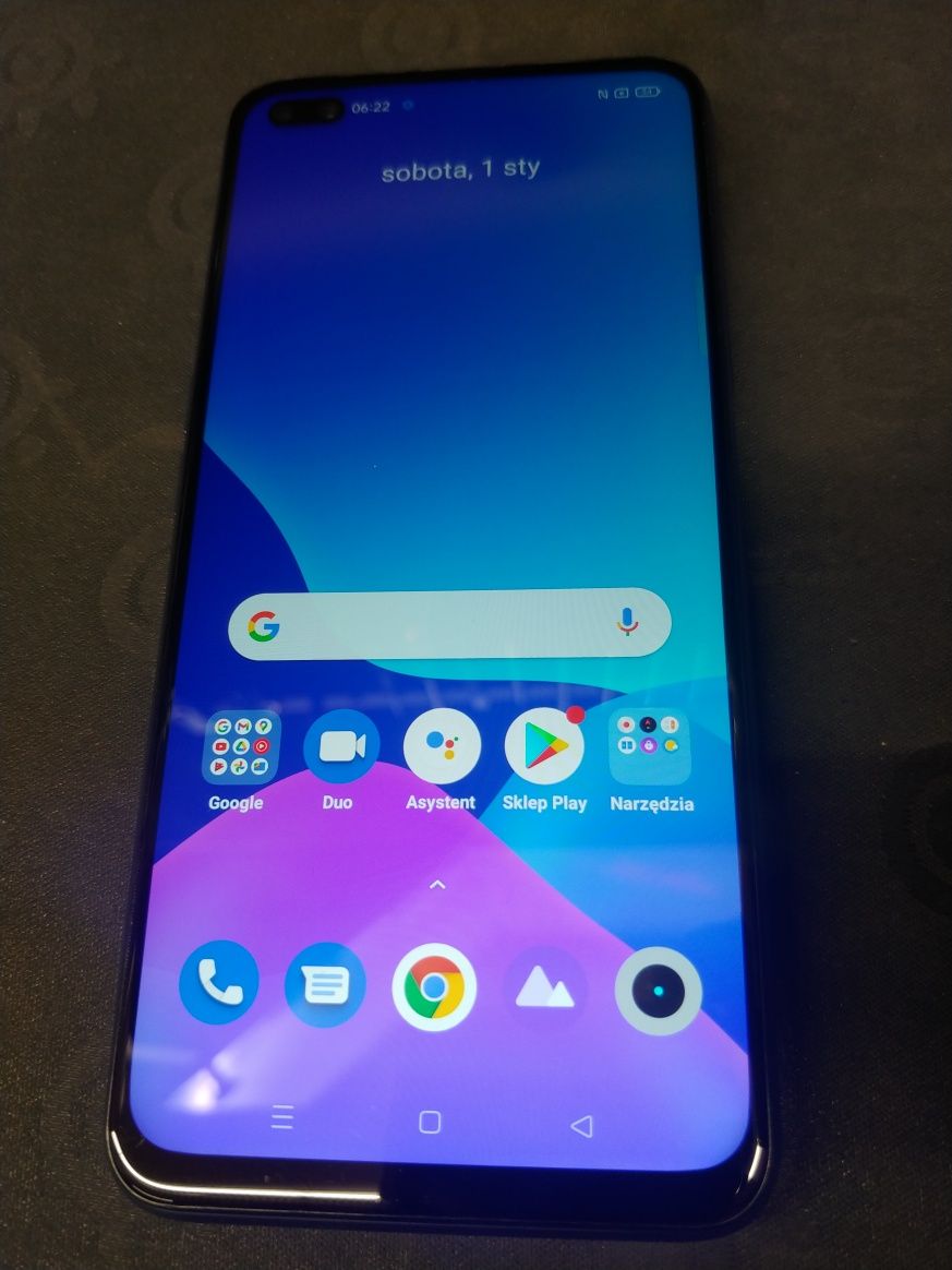 Realme X50 5g 6,128GB.