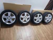 Alufelgi 4x108 15 MAZDA 2, FORD Fiesta Ka Fusion, opony letnie KURIER