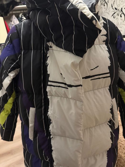 Зимовий довгий пуховик