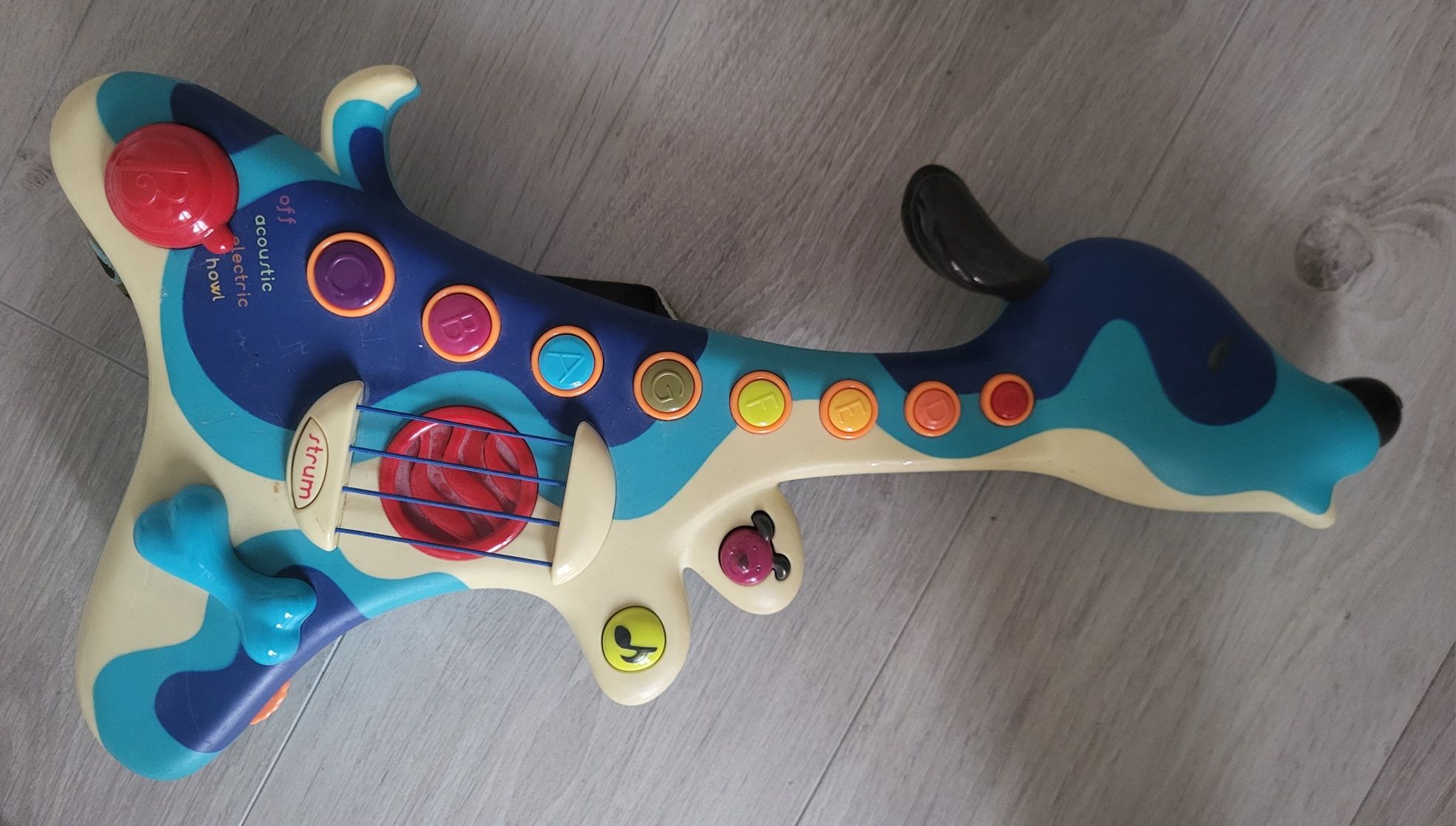 Музична іграшка Battat Пес-гітарист з коротким ремінцем