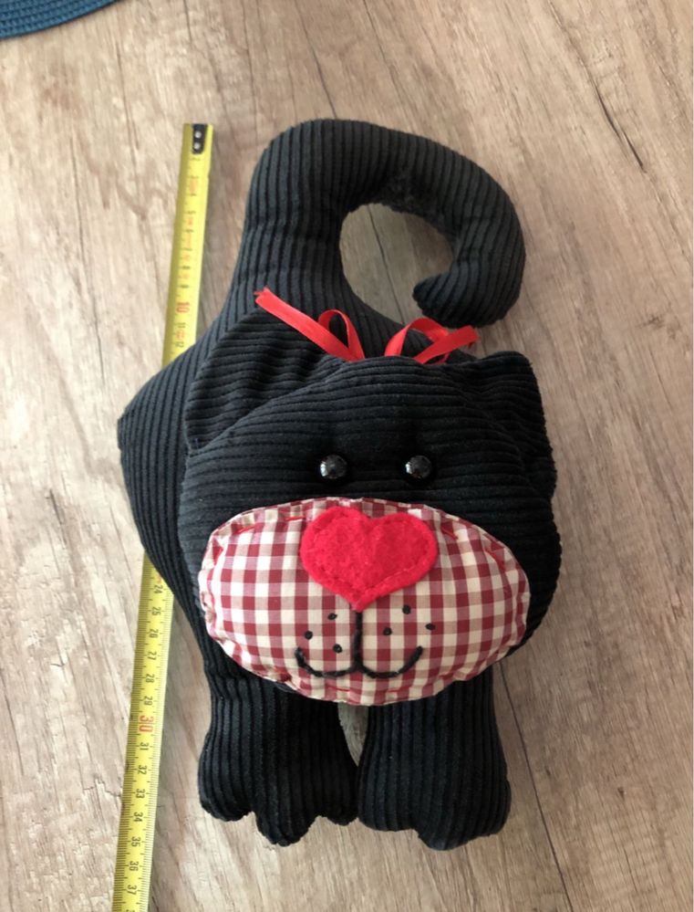 Kot odbijak odbojnik na klamkę drzwi