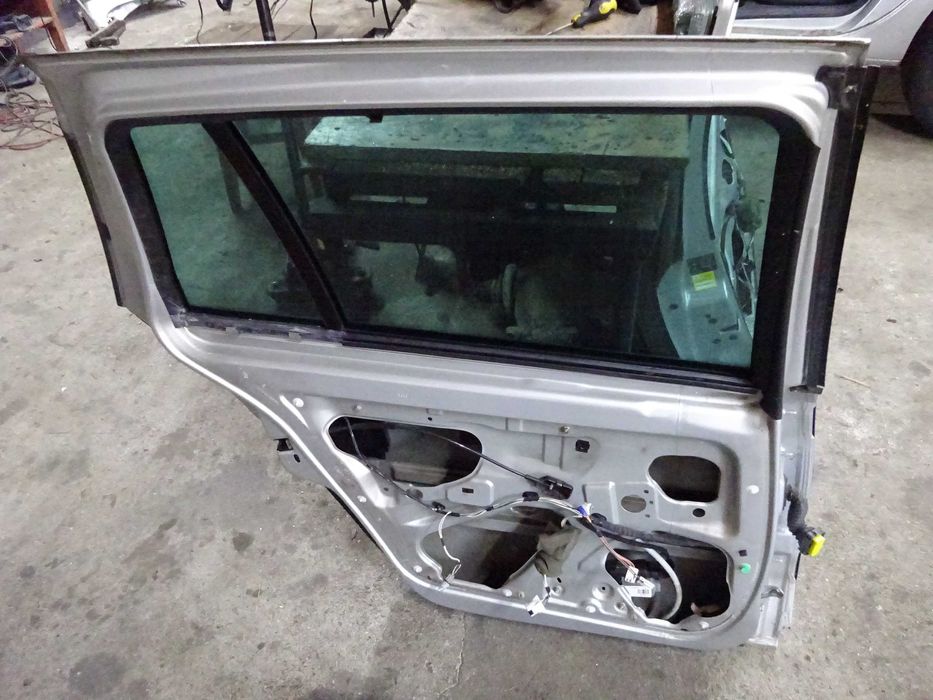Drzwi lewe tylne lewy tył Renault Laguna 2 II Lift kombi TED69